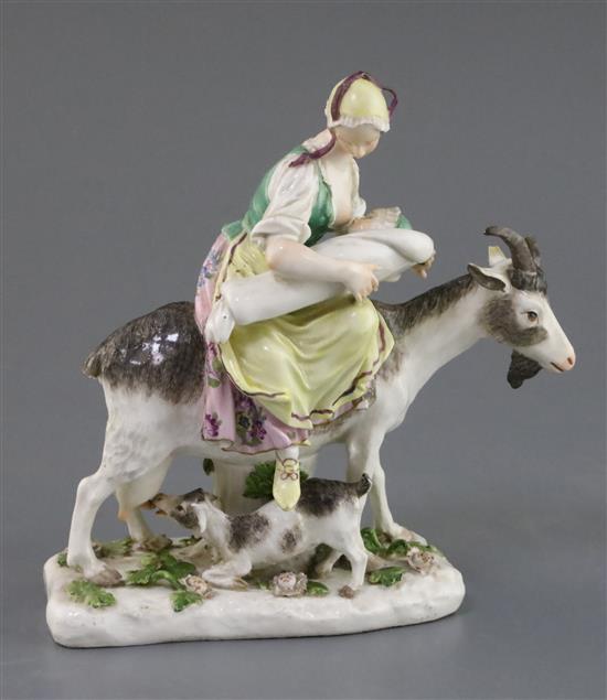 A Meissen group of the Tailors wife, c.1750, height 17.5cm, some losses